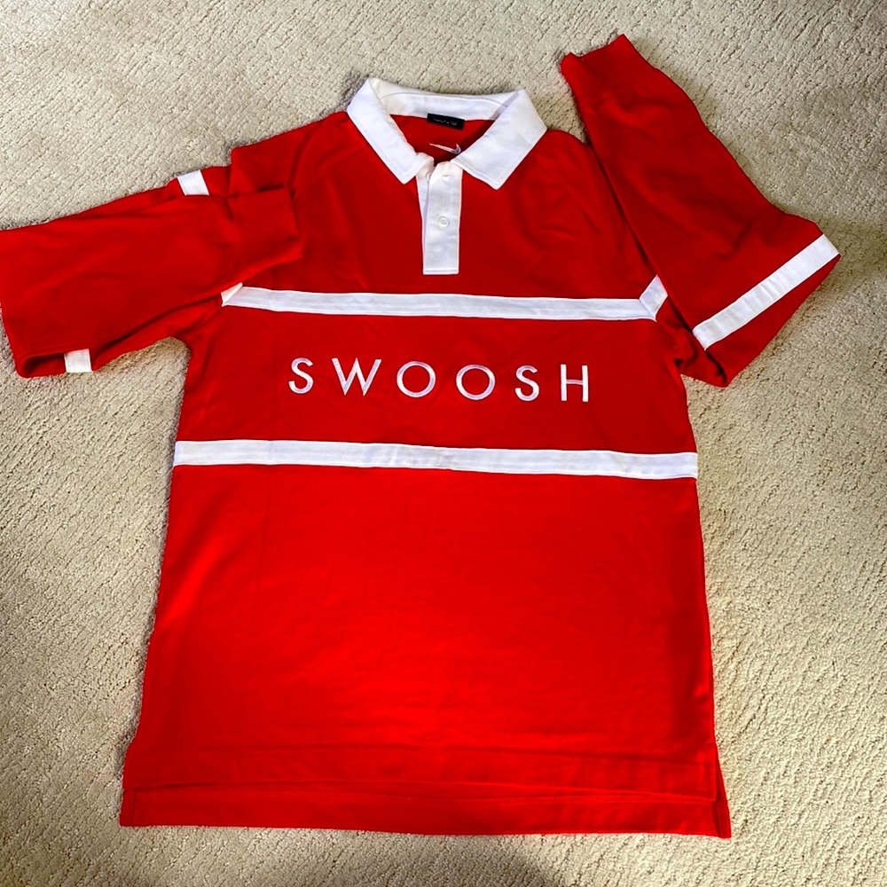 Men’s size medium, never worn, long sleeve, collared Nike swoosh top